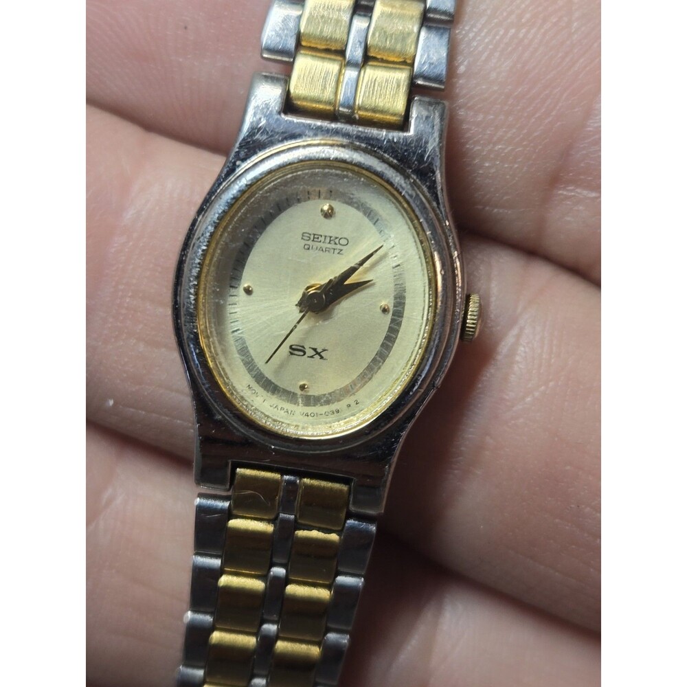 Vintage Seiko V401-5101 SX Ladies' 17mm Two Tone Stainless Steel Watch. 7.5".